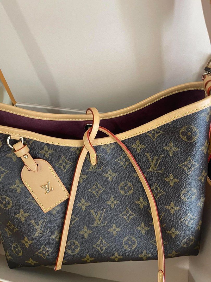Louis Vuitton Monogram Canvas Carryall PM with Pouch (Category: Luxury Bags & Wallets) located in Manila. Submitted by lunacakes (Listing ID 1469600706, Image 3). Description: - Authentic Louis Vuitton Monogram canvas hobo shoulder bag - Features premium vachetta leather trim with chic red glazing - Includes a matching zippered pochette pouch for extra storage - Beautiful burgundy interior lining with durable gold-tone hardware - Comes complete w