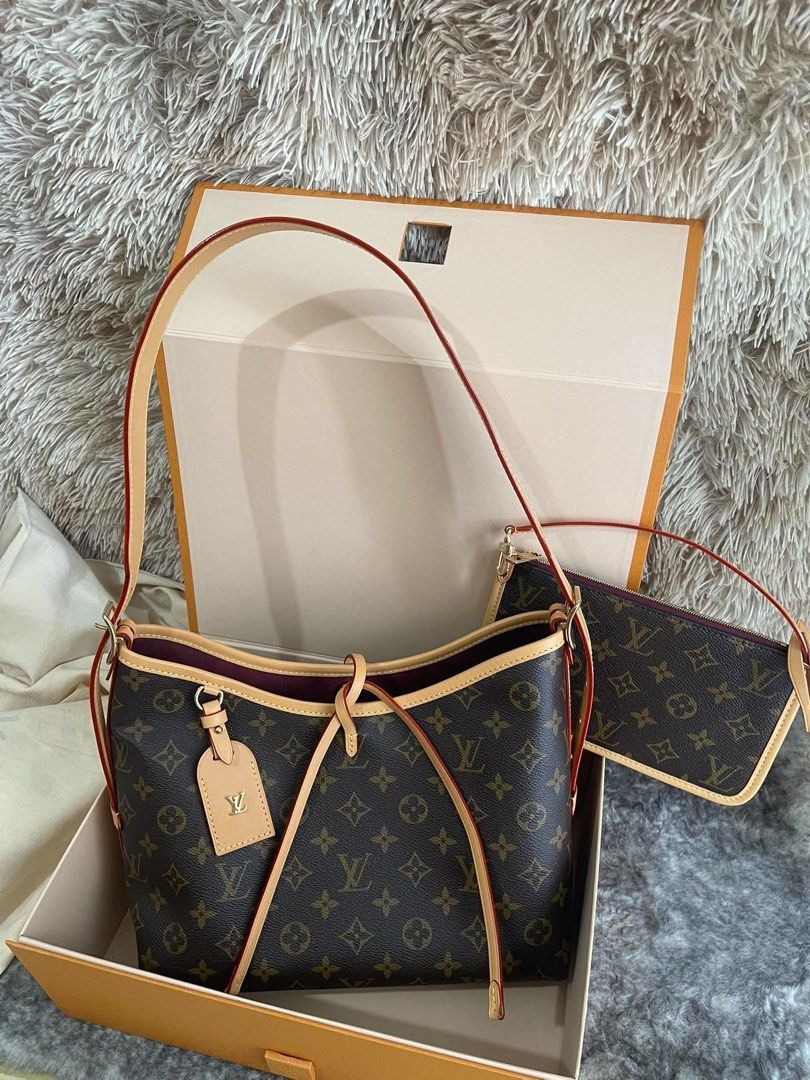 Louis Vuitton Monogram Canvas Carryall PM with Pouch (Category: Luxury Bags & Wallets) located in Manila. Submitted by lunacakes (Listing ID 1469600706, Image 1). Description: - Authentic Louis Vuitton Monogram canvas hobo shoulder bag - Features premium vachetta leather trim with chic red glazing - Includes a matching zippered pochette pouch for extra storage - Beautiful burgundy interior lining with durable gold-tone hardware - Comes complete w