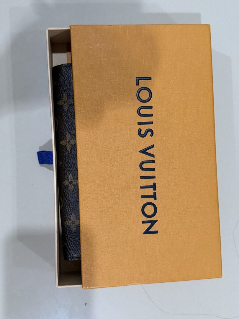 Louis Vuitton Monogram Eclipse Clutch Wallet with Box (Category: Luxury Bags & Wallets) located in Makati City. Submitted by beadle.yeng (Listing ID 1469688838, Image 2). Description: With OR and Box Price when bought p64,0000 Selling for 18 only - Authentic Louis Vuitton wristlet crafted from iconic monogram canvas and black leather - Features secure silver hardware and a convenient attached wrist strap - Well-organized interior with built-in ca