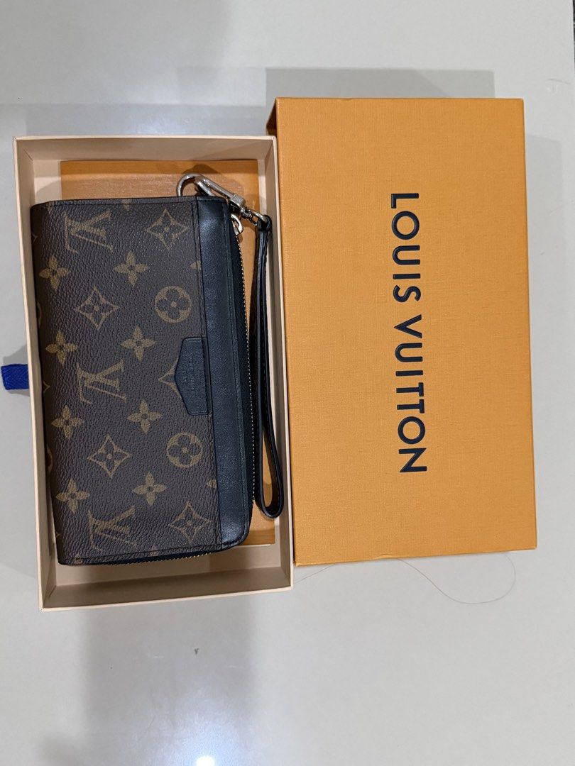 Louis Vuitton Monogram Eclipse Clutch Wallet with Box (Category: Luxury Bags & Wallets) located in Makati City. Submitted by beadle.yeng (Listing ID 1469688838, Image 1). Description: With OR and Box Price when bought p64,0000 Selling for 18 only - Authentic Louis Vuitton wristlet crafted from iconic monogram canvas and black leather - Features secure silver hardware and a convenient attached wrist strap - Well-organized interior with built-in ca