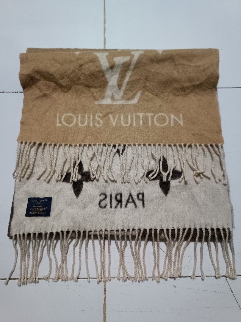 Louis Vuitton Monogram Gradient Cashmere Scarf (Category: Scarves) located in Barotac Nuevo. Submitted by gray101 (Listing ID 1469698567, Image 1). Description: Luxurious Louis Vuitton cashmere scarf with signature monogram pattern and gradient brown-to-cream colorway. Fringe details along both ends. Includes woven blue brand tag displaying dry clean only instructions, 100% cashmere material composition, and made in United Kingdom origin. Soft te