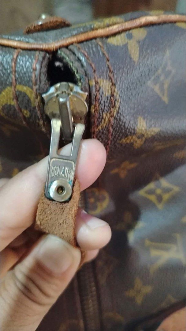 Louis Vuitton Monogram Keepall 50 Predated Authentic (Category: Luxury Bags & Wallets) located in Tacloban City. Submitted by luxbag_phhh (Listing ID 1469752064, Image 2). Description: - Authentic Pre dated vintage Louis Vuitton Keepall 50 travel bag in iconic brown monogram canvas - Measures approx. 50cm across, ideal for weekend trips or as a carry-on luggage - Features secure brass zipper hardware stamped with Eclair - Beautiful natural honey 