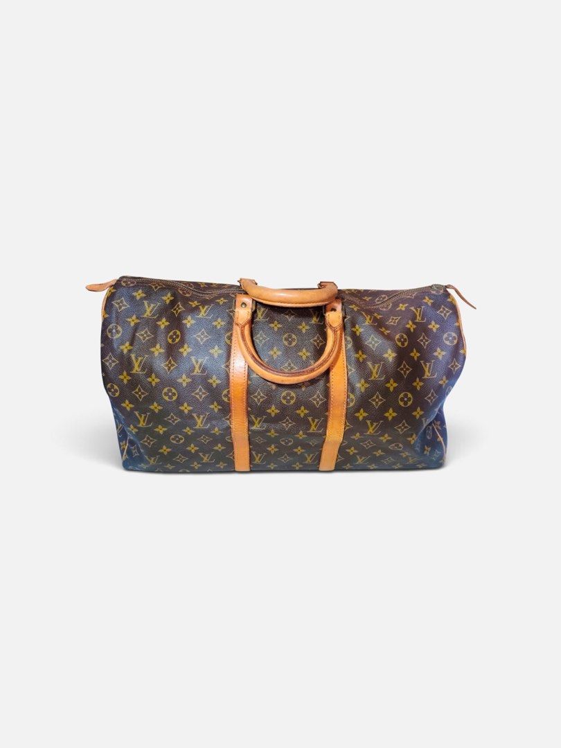 Louis Vuitton Monogram Keepall 50 Predated Authentic (Category: Luxury Bags & Wallets) located in Tacloban City. Submitted by luxbag_phhh (Listing ID 1469752064, Image 1). Description: - Authentic Pre dated vintage Louis Vuitton Keepall 50 travel bag in iconic brown monogram canvas - Measures approx. 50cm across, ideal for weekend trips or as a carry-on luggage - Features secure brass zipper hardware stamped with Eclair - Beautiful natural honey 