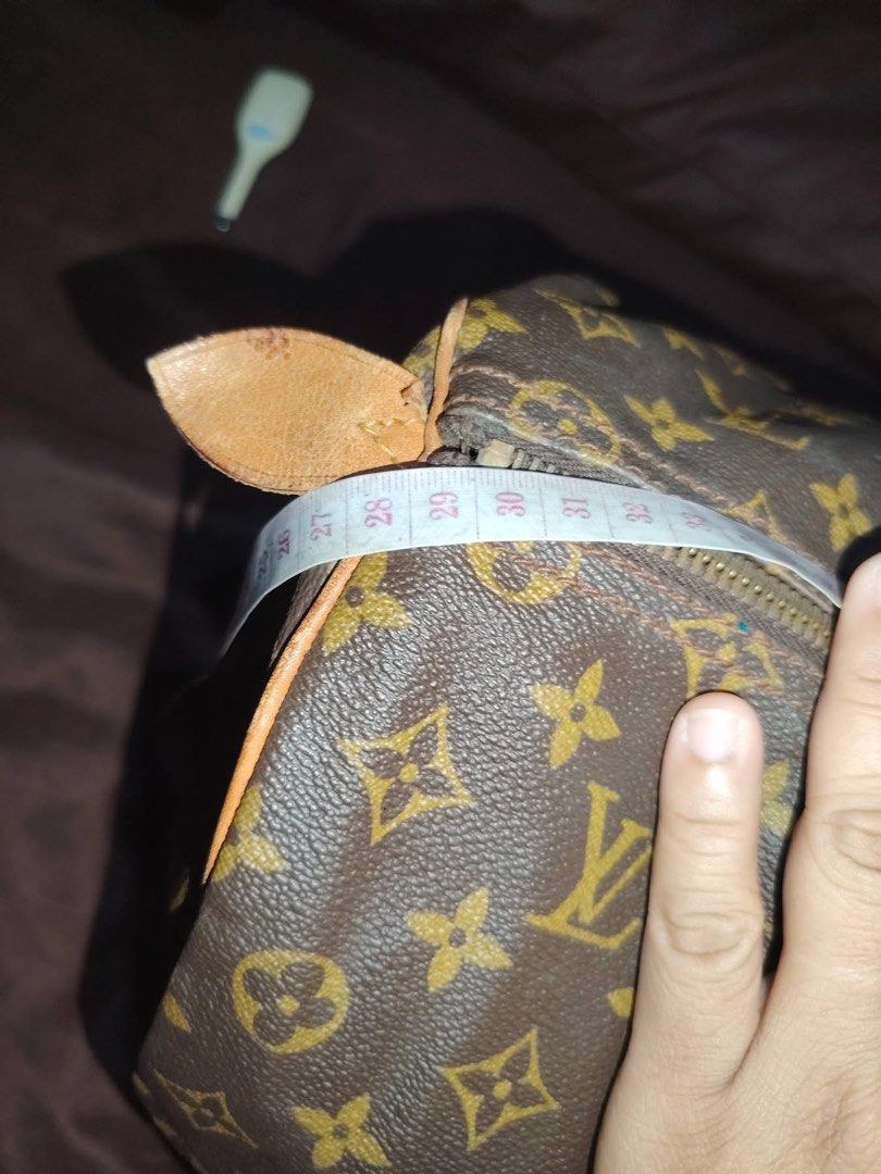 Louis Vuitton Monogram Keepall 50 Predated Authentic (Category: Luxury Bags & Wallets) located in Tacloban City. Submitted by luxbag_phhh (Listing ID 1469752064, Image 3). Description: - Authentic Pre dated vintage Louis Vuitton Keepall 50 travel bag in iconic brown monogram canvas - Measures approx. 50cm across, ideal for weekend trips or as a carry-on luggage - Features secure brass zipper hardware stamped with Eclair - Beautiful natural honey 