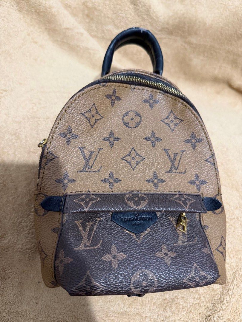 Louis Vuitton Monogram Palm Springs Mini Backpack (Category: Luxury Bags & Wallets) located in Quezon City. Submitted by skyleeeee (Listing ID 1469583069, Image 1). Description: - NGA Louis Vuitton mini backpack in signature brown monogram canvas - Sleek black leather top handle, trim, and adjustable D-ring back straps - Secure double-zip main closure and front zipped pocket with branded leather tag - Gleaming gold-tone hardware engraved with LV 