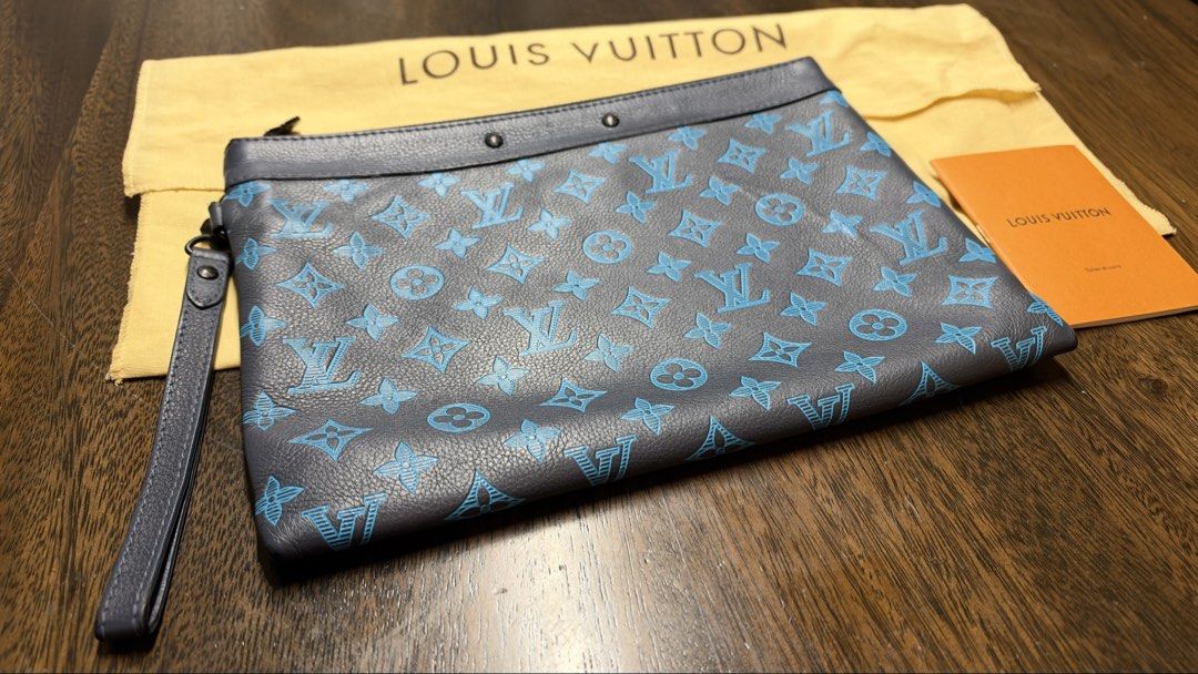 Louis Vuitton Monogram Pochette Clutch Navy Blue (Category: Luxury Bags & Wallets) located in Pasig City. Submitted by jeysonned (Listing ID 1469711821, Image 2). Description: Louis Vuitton Pochette To Go Clutch Bag Selling my LV Pochette To Go. Inclusions: Dustbag, Cards Shows signs of usage as shown in photo but over-all quality of the bag remains good for personal use. RFS: Decluttering some of my pouch/clutch bags. No swaps. Slightly negotiab
