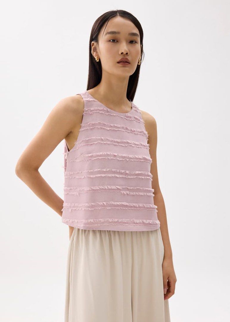 Love Bonito Top XS (Category: Sleeveless) located in Quezon City. Submitted by fitfoundbyli (Listing ID 1469577807, Image 1). Description: - Brand: Love Bonito - Style: Sleeveless top with textured horizontal fringe rows - Details: Round neckline, back keyhole with button closure, fully lined - Size: XS (Fits US 2 / UK 6) - Original price: ₱1,890 - Condition: Clean, excellent, no flaws found - Shipping via J&T.