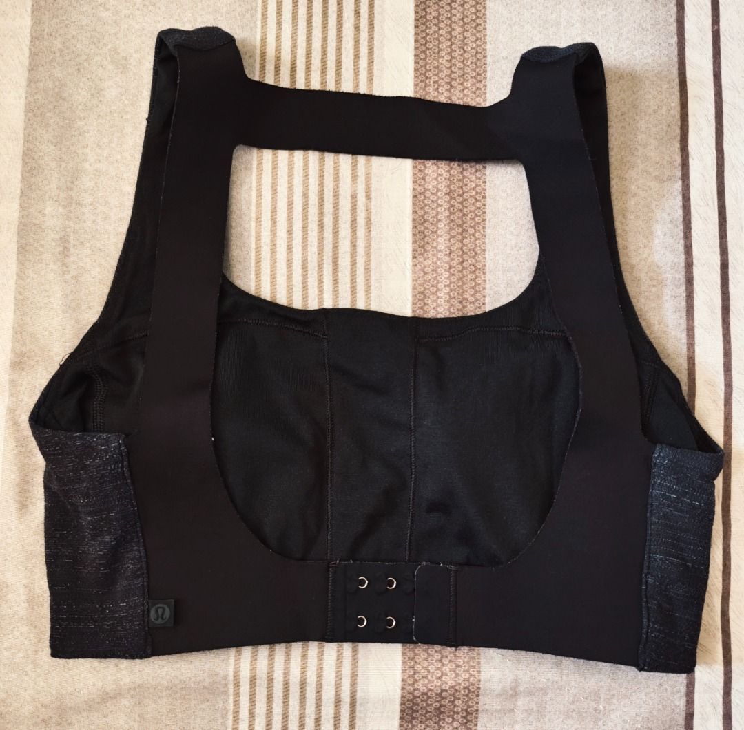 Lululemon Black Athletic Varsa Bra Workout Top (Category: Activewear) located in Pasig City. Submitted by peachesncreams (Listing ID 1469711505, Image 2). Description: - Authentic Lululemon sports bra - Color: Black heathered - Square neckline with wide, supportive straps - Iconic omega logo stamped on the back strap - Stretchy, shape-retaining material - Ideal for gym workouts, running, and yoga -Size Dot 6.