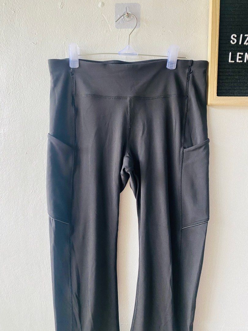 Lululemon Black Leggings (Category: Activewear) located in Caloocan City. Submitted by lovemyclothes21 (Listing ID 1469611645, Image 2). Description: - Brand: Lululemon - Color: Classic Black - Size/Fit: Fits waist 28" - 30", 21" length - Features: Dual side pockets and a secure back zipper pocket at the waistband - Branding: Iconic Lululemon logo on the lower left leg - Material: Super stretchy, breathable, and comfortable fabric.