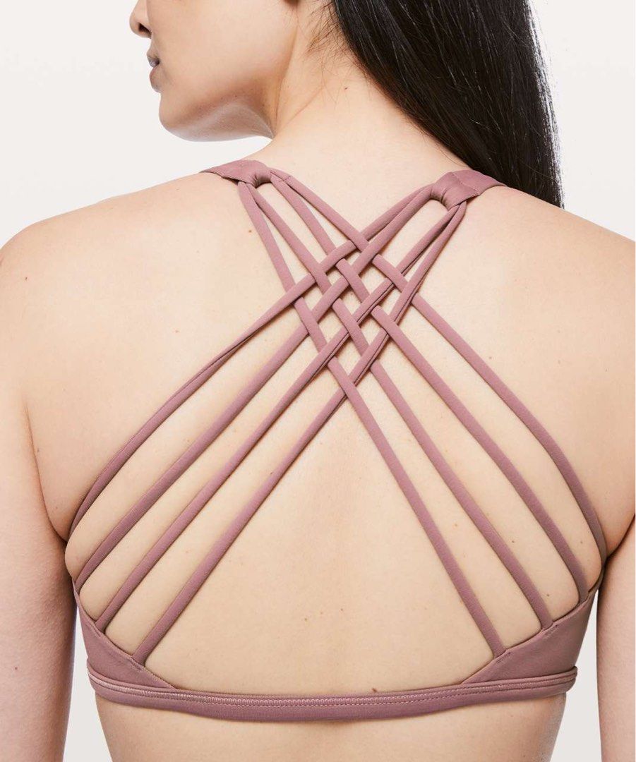 Lululemon Free To Be Wild Bra dot 6 (Category: Activewear) located in Rosales. Submitted by dariang22 (Listing ID 1469602669, Image 2). Description: - Brand: Lululemon - Color: spanish rose - Design: Scoop neckline with wide shoulder straps - Back Details: Multiple delicate crisscrossing straps for breathability and support - Fabric: Soft, stretchy athletic material that moves with you - Extras: Includes slots for removable cups - Condition: natu