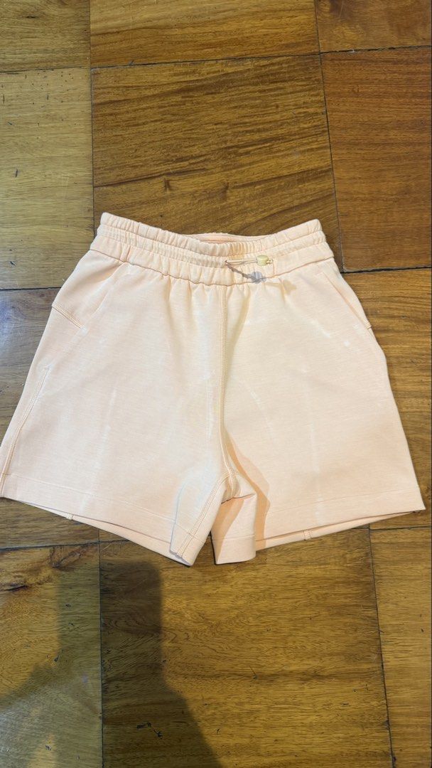 Lululemon High-Rise Shorts 4” (Category: Shorts) located in Makati City. Submitted by thevault88 (Listing ID 1469689906, Image 2). Description: - Brand: Lululemon - Color: Soft Peach - Material: cozy cotton blend fleece - Waistband: Elastic with adjustable cinch cord - Design: Structured paneling on front and back with subtle embroidered logo on back hip.