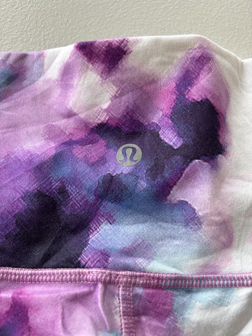 Lululemon Purple Tie Dye cycling (Category: Activewear) located in Iloilo. Submitted by oddforest.c9c7d5 (Listing ID 1467647382, Image 2). Description: - Brand: Lululemon - Style: High-waisted athletic shorts with signature logo on back waistband - Color/Print: Purple, blue, and white tie-dye watercolor - Fabric: Buttery soft, ideal for workouts or lounging -W 27-28 L 14.
