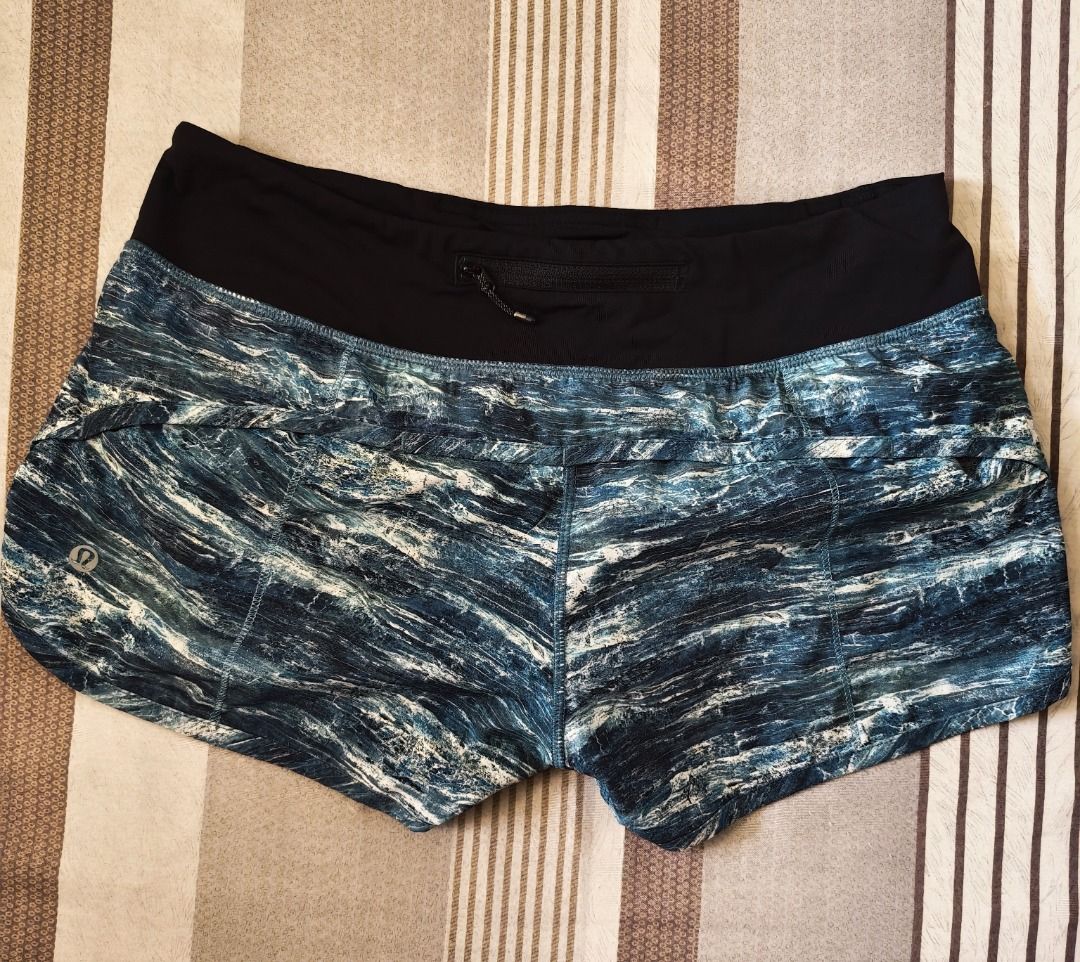 Lululemon Speed Up Shorts Blue Marble Print (Category: Shorts) located in Pasig City. Submitted by peachesncreams (Listing ID 1469710237, Image 2). Description: - Brand: Lululemon - Style: Athletic / Running shorts - Design: Blue and black abstract marble print - Features: Wide black waistband, secure back zip pocket, adjustable drawstring, and reflective logo on left leg - Material: Lightweight and stretchy - Condition: Great pre-loved condition