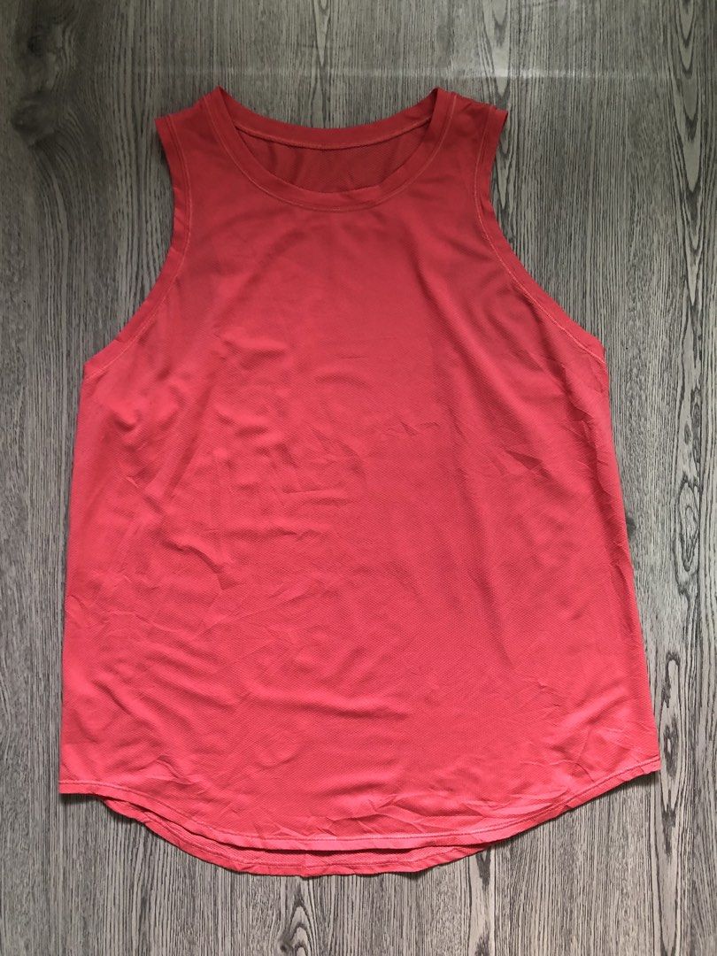 LULULEMON tanktop (Category: Activewear) located in Santa Rosa. Submitted by eceldg05 (Listing ID 1469603746, Image 3). Description: LULULEMON TANKTOP CUTTAG medium fit Coral peach color Like new.