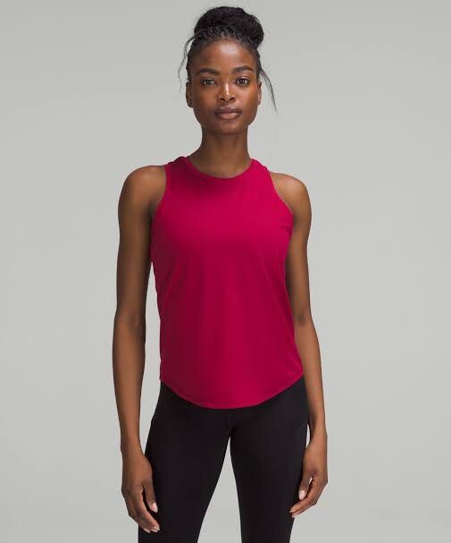 LULULEMON tanktop (Category: Activewear) located in Santa Rosa. Submitted by eceldg05 (Listing ID 1469603746, Image 1). Description: LULULEMON TANKTOP CUTTAG medium fit Coral peach color Like new.