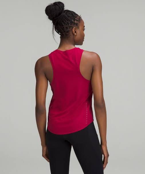 LULULEMON tanktop (Category: Activewear) located in Santa Rosa. Submitted by eceldg05 (Listing ID 1469603746, Image 2). Description: LULULEMON TANKTOP CUTTAG medium fit Coral peach color Like new.