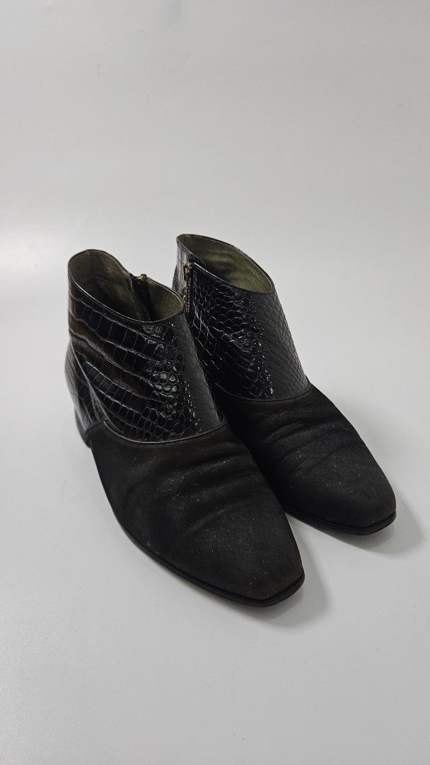 Luna Mattino black ankle boots (Category: Boots) located in Alfonso. Submitted by jbcamet (Listing ID 1469703042, Image 1). Description: - Brand: Luna Mattino - Style: Black ankle boots - Material: Suede-like toe combined with glossy croc-embossed leather around the ankle - Closure: Side zipper with custom hardware pulls - Sole & Heel: Low stacked heels and textured rubber outsoles for better grip - Interior: Vibrant green inner lining with brand