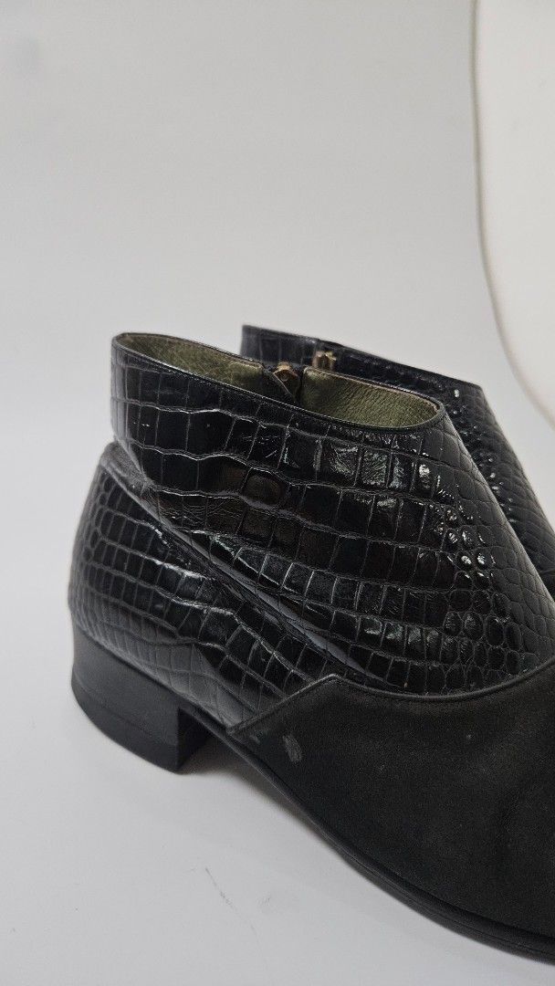 Luna Mattino black ankle boots (Category: Boots) located in Alfonso. Submitted by jbcamet (Listing ID 1469703042, Image 2). Description: - Brand: Luna Mattino - Style: Black ankle boots - Material: Suede-like toe combined with glossy croc-embossed leather around the ankle - Closure: Side zipper with custom hardware pulls - Sole & Heel: Low stacked heels and textured rubber outsoles for better grip - Interior: Vibrant green inner lining with brand