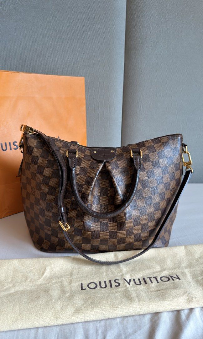 LV Damier Ebene Siena MM (Category: Luxury Bags & Wallets) located in Quezon City. Submitted by gzluxe (Listing ID 1469601209, Image 1). Description: LV Siena in MM size 💯 Auth Comes with dustbag and paperbag Good condition .