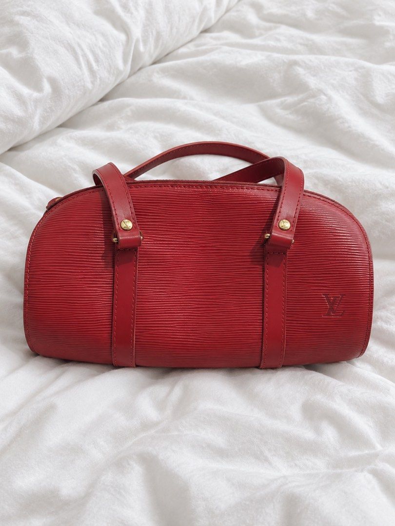 LV Epi leather barrel-style handbag in red (Category: Luxury Bags & Wallets) located in Manila. Submitted by lexiandco.ph (Listing ID 1469675310, Image 1). Description: PM FOR THE PRICE.