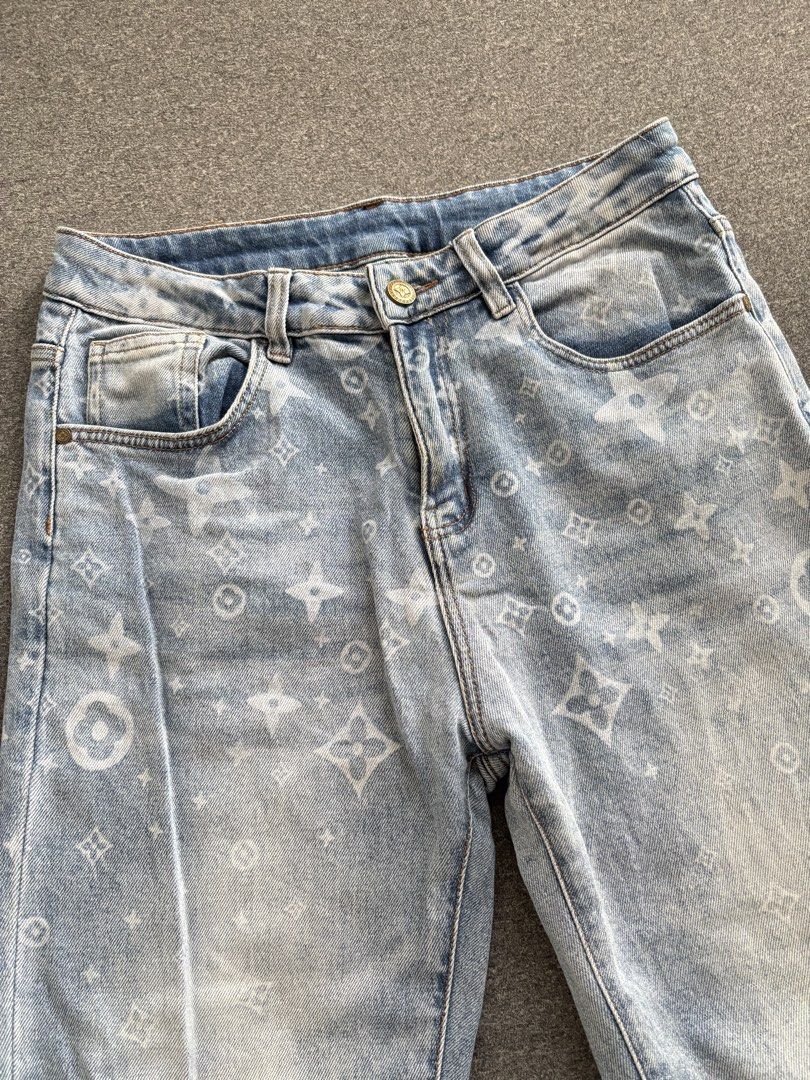 Lv mono pants size 32 (Category: Jeans) located in Manila. Submitted by cappadociadream (Listing ID 1469651934, Image 2). Description: - Style: Light wash blue denim pants with an all-over white monogram print - Fit: Straight leg, mid to high rise waist - Details: Front button closure, belt loops, front and back pockets - Material: Comfortable, high-quality cotton - Condition: Worn once for photos, super clean and ready to wear - Versatility: Eas