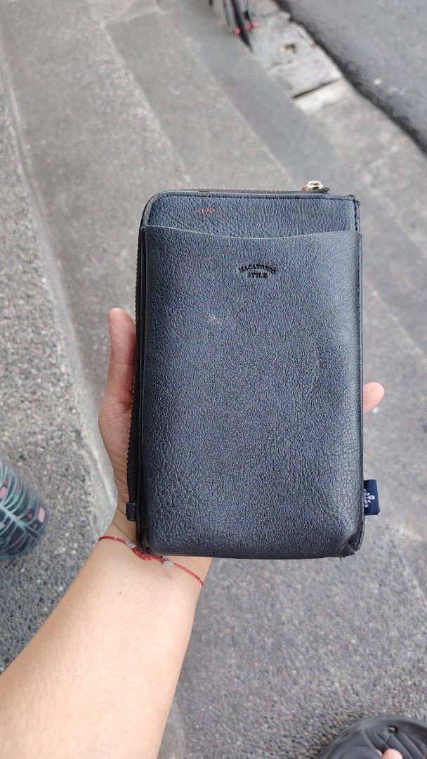 Macaronic Style Black Phone Wallet Organizer (Category: Wallets & Card holders) located in Manila. Submitted by purediamond888 (Listing ID 1469657864, Image 3). Description: - Brand: Macaronic Style - Material: Premium black faux leather with stylish - Closure: Secure zip-around design - Storage: Multiple card slots, cash compartments, and an inner zippered coin pocket - Exterior: Convenient slip pockets on both front and back - Versatility: Incl