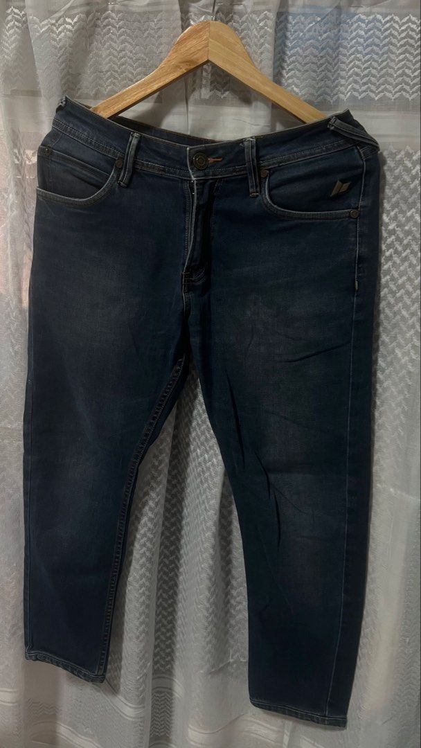 Macbeth Slim Fit Jeans Size 32 (Category: Jeans) located in Pasig City. Submitted by morilove (Listing ID 1469588976, Image 1). Description: - Brand: Macbeth - Color: Dark blue (clean wash with contrast stitching) - Size: 32 - Fit: Slim fit - Closure: Standard button and zip fly - Details: Stitched detailing on back pockets.