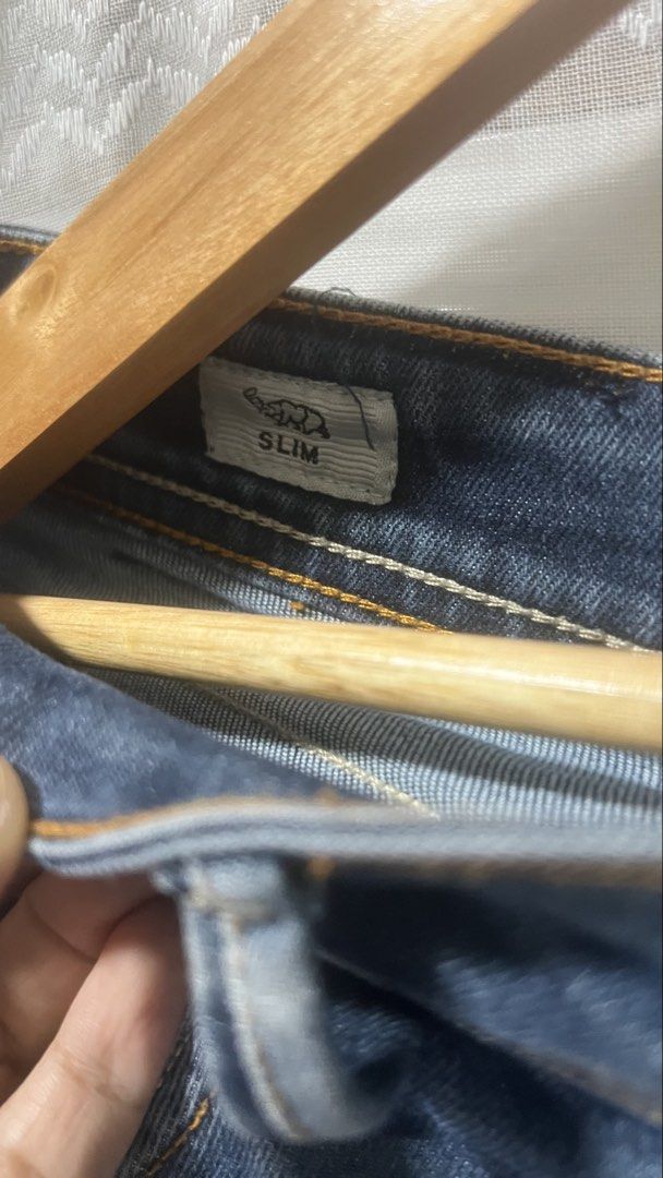 Macbeth Slim Fit Jeans Size 32 (Category: Jeans) located in Pasig City. Submitted by morilove (Listing ID 1469588976, Image 3). Description: - Brand: Macbeth - Color: Dark blue (clean wash with contrast stitching) - Size: 32 - Fit: Slim fit - Closure: Standard button and zip fly - Details: Stitched detailing on back pockets.