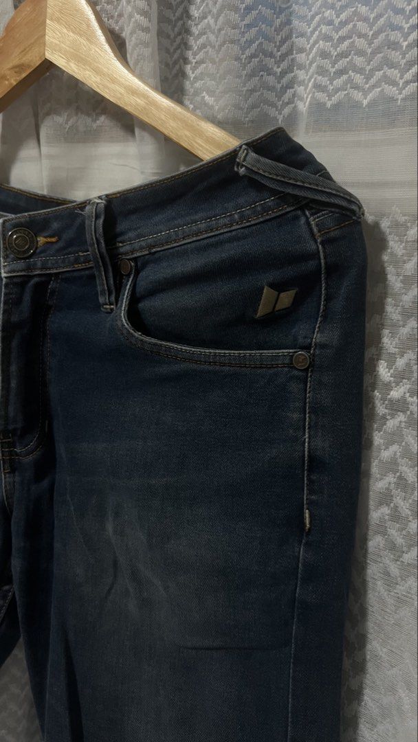 Macbeth Slim Fit Jeans Size 32 (Category: Jeans) located in Pasig City. Submitted by morilove (Listing ID 1469588976, Image 2). Description: - Brand: Macbeth - Color: Dark blue (clean wash with contrast stitching) - Size: 32 - Fit: Slim fit - Closure: Standard button and zip fly - Details: Stitched detailing on back pockets.