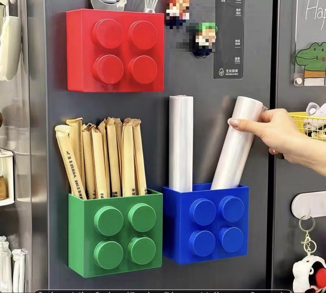 Magnetic fridge spice racks and storage boxes set 4pcs (Category: Food Organization & Storage) located in Quezon City. Submitted by tin.008 (Listing ID 1469692281, Image 3). Description: - 4-piece magnetic storage rack set - Mounts easily onto refrigerators and metal surfaces - Multicolored toy building brick design - Perfect for organizing spices, snacks, and kitchen essentials - Frees up valuable counter space.
