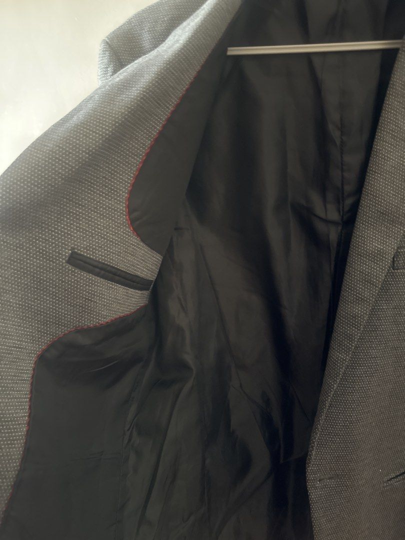 Main Street Grey Textured Blazer Size S (Category: Coats, Jackets and Outerwear) located in Manila. Submitted by amazingamie8 (Listing ID 1469579833, Image 3). Description: - Brand: Main Street - Size: S - Color/Pattern: Grey patterned - Details: Single-button closure, notched lapels, structured shoulders, and single back vent - Pockets: Two front pockets - Lining: Black inner lining with red piping - Material: Polyester and cupro bemberg (see la