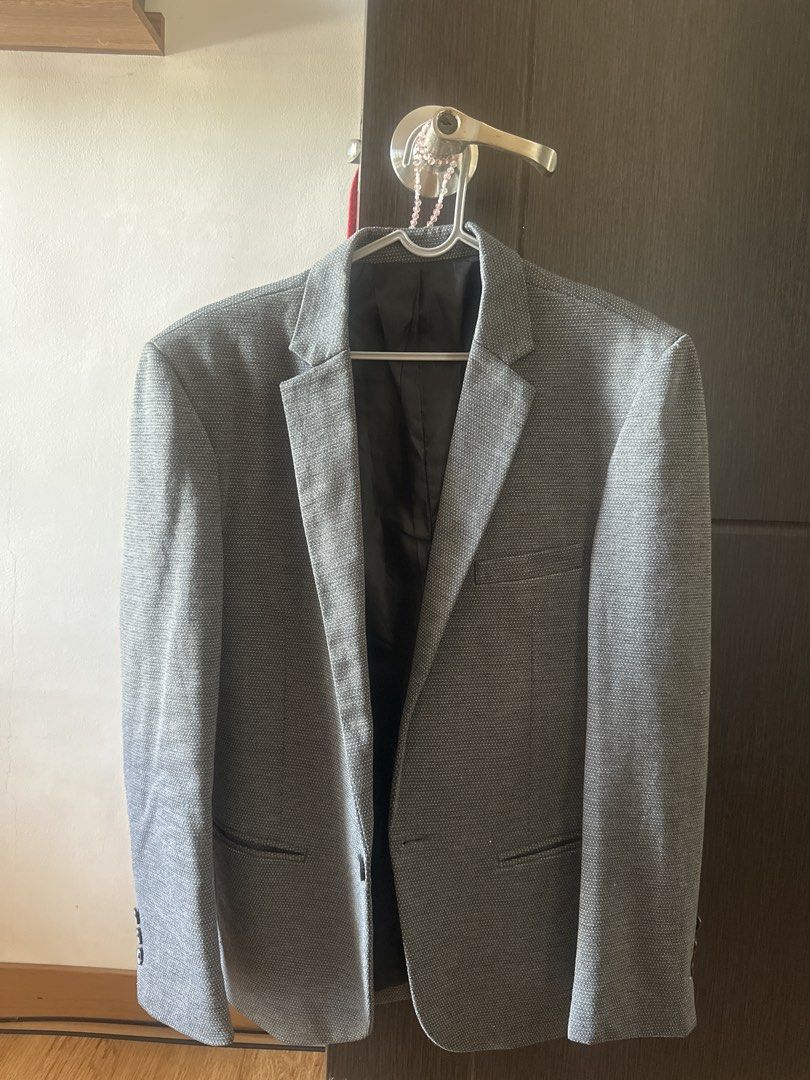 Main Street Grey Textured Blazer Size S (Category: Coats, Jackets and Outerwear) located in Manila. Submitted by amazingamie8 (Listing ID 1469579833, Image 1). Description: - Brand: Main Street - Size: S - Color/Pattern: Grey patterned - Details: Single-button closure, notched lapels, structured shoulders, and single back vent - Pockets: Two front pockets - Lining: Black inner lining with red piping - Material: Polyester and cupro bemberg (see la
