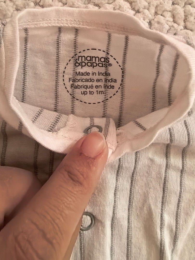Mamas & Papas Striped Baby Romper (Category: Babies & Kids Fashion) located in Manila. Submitted by euladelosr38638 (Listing ID 1469651874, Image 2). Description: - Brand: Mamas & Papas - Size: Fits up to 1 month old - Design: White with grey vertical stripes - Material: Soft ribbed cotton - Features: Short sleeves, front snap button closure for easy changing, and two front pockets - Never been used, washed Can ship through orange app.