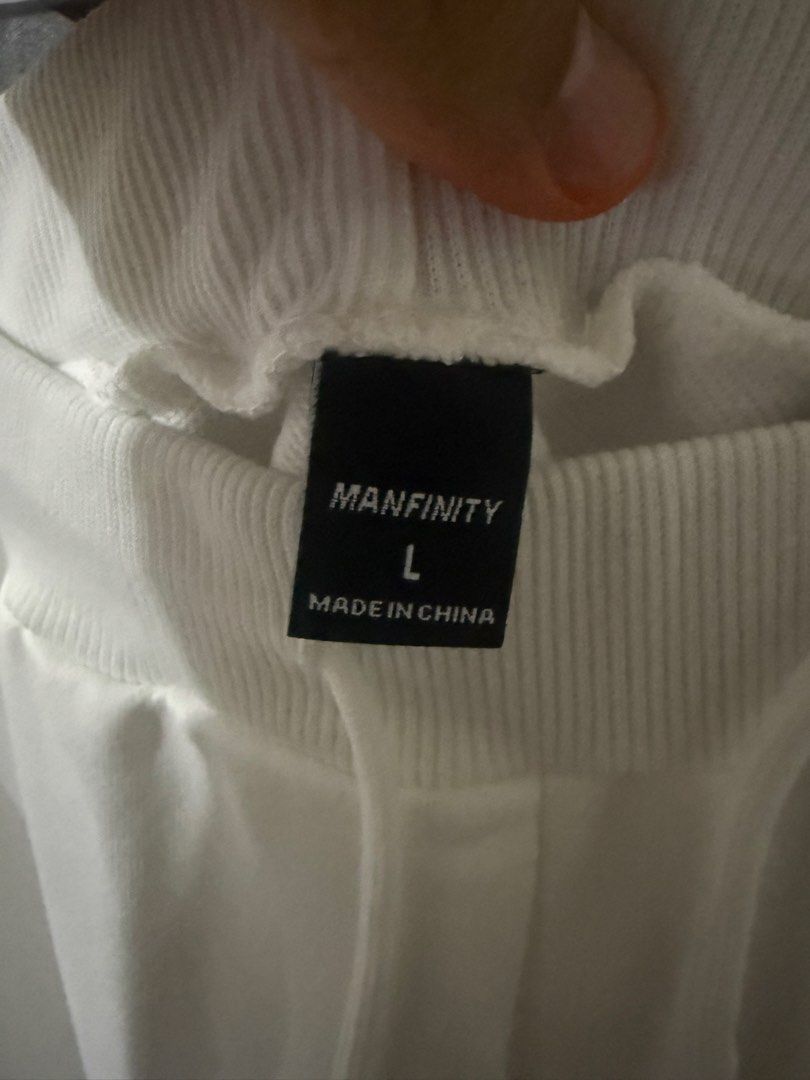 MANFINITY Plain White Joggers (Category: Joggers) located in Las Pinas. Submitted by sellerkjb (Listing ID 1469711248, Image 3). Description: BRAND NEW LARGE waist — 32-42 inches length — 38 inches Las Pinas.