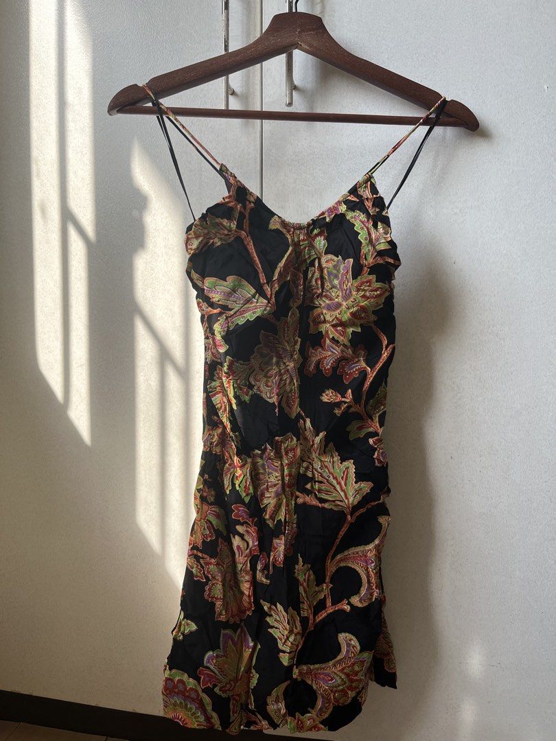 MANGO Paisley Print Spaghetti Strap Dress Size S (Category: Dresses) located in Pasig City. Submitted by papainyourhead (Listing ID 1469632430, Image 1). Description: - Brand: MNG - Size: S - Design: Vibrant green, orange, and purple paisley and floral pattern on a black base - Details: Spaghetti straps, ruched center front, side zipper closure - Material: Lightweight fabric - Best for: Warm weather, casual days, or going out - PM for measurement