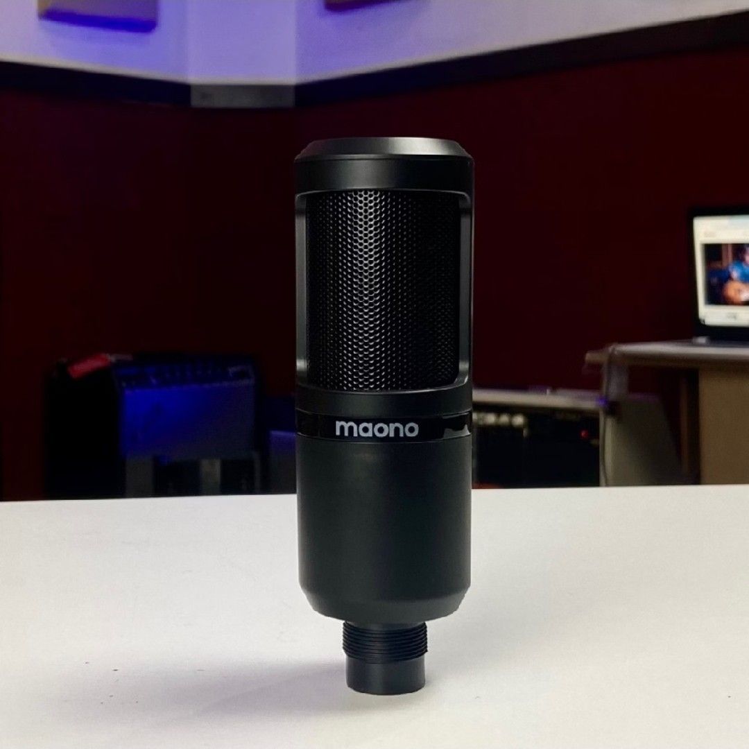 Maono Condenser Microphone with Tripod Stand (Category: Microphones) located in San Mateo. Submitted by reyshel08 (Listing ID 1469607414, Image 1). Description: - Model: Maono Condenser Microphone - Finish: Sleek matte black - Connectivity: Standard XLR connection at the base - Includes: Compact folding desk tripod stand - Audio Quality: Clean and crisp audio capture - Ideal Use: Great for podcasts, live streaming, and voice recordings - Conditio