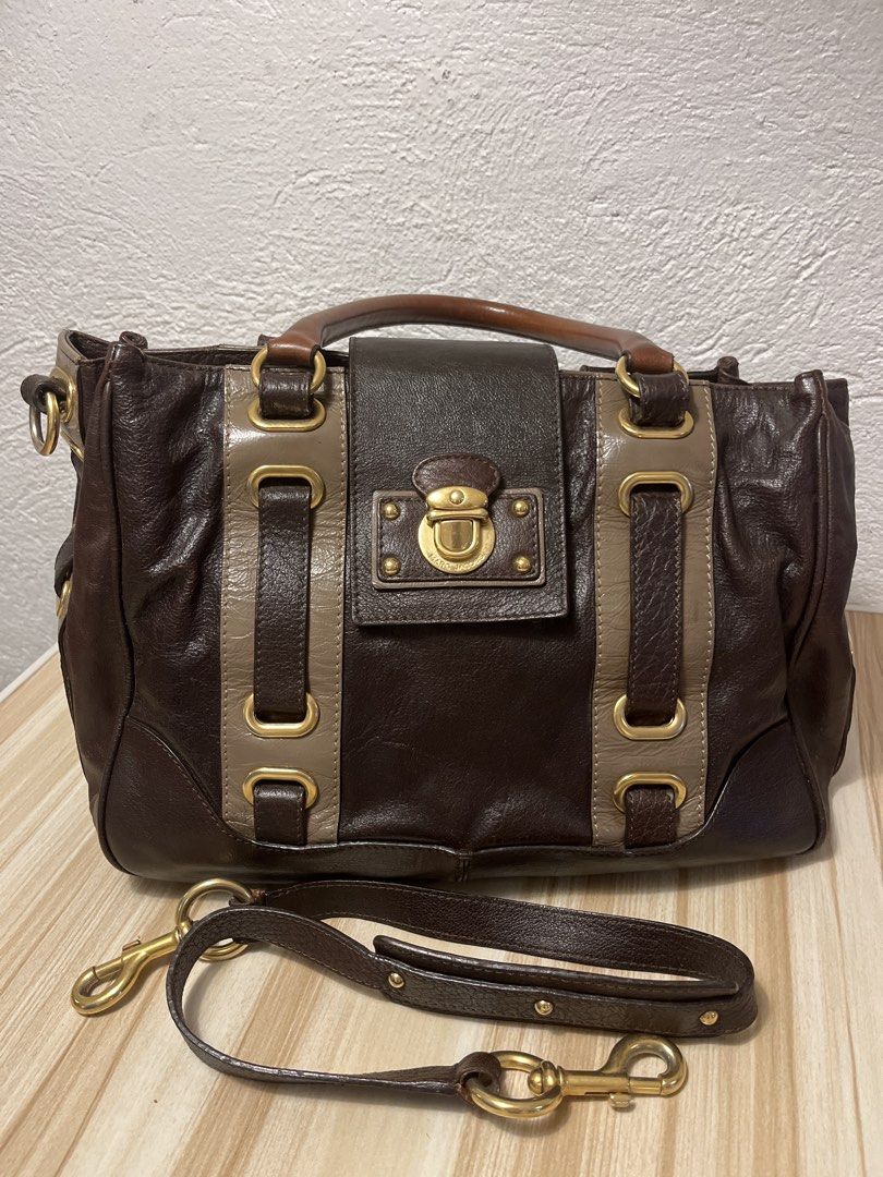 Marc Jacobs (Category: Luxury Bags & Wallets) located in Manila. Submitted by Lenlen23 (Listing ID 1465206018, Image 1). Description: The Marc Jacobs Collection Striped Hudson Bag Brown Beige Satchel 2 Way CarryThe Marc Jacobs Collection Striped Hudson Bag Brown Beige Satchel 2 Way Carry .