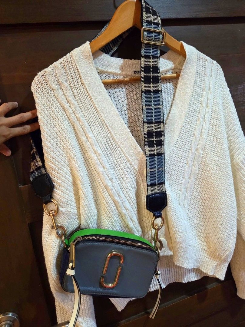 Marc Jacobs Snapshot Camera Bag with Plaid Strap (Category: Luxury Bags & Wallets) located in Manila. Submitted by mysticrabbit.284012 (Listing ID 1469581102, Image 1). Description: - Brand: Marc Jacobs - Style: Multi-color camera bag (Grey, Bright Green, Blue) - Hardware: Gold-tone hardware with leather zipper pull tabs - Compartments: Double zip closure with black fabric interior lining and slip pockets - Strap: Adjustable and thick webbed stra