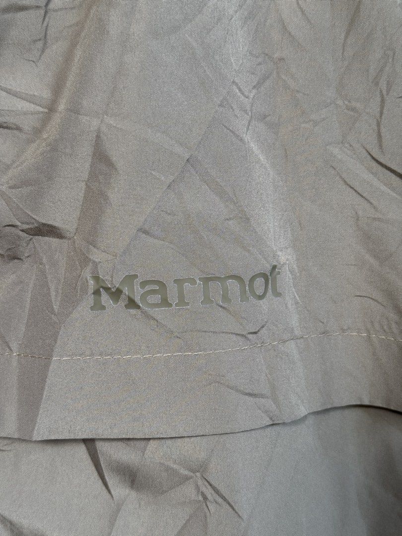 MARMOT Short Sleeve outdoor jacket (Category: Activewear) located in Manolo Fortich. Submitted by thriftacktoe34 (Listing ID 1469698551, Image 3). Description: Excellent condition Color rate 9.5/10 Size XL Dimes W23 x L28 Issue: missing hood FREE shipping fee.