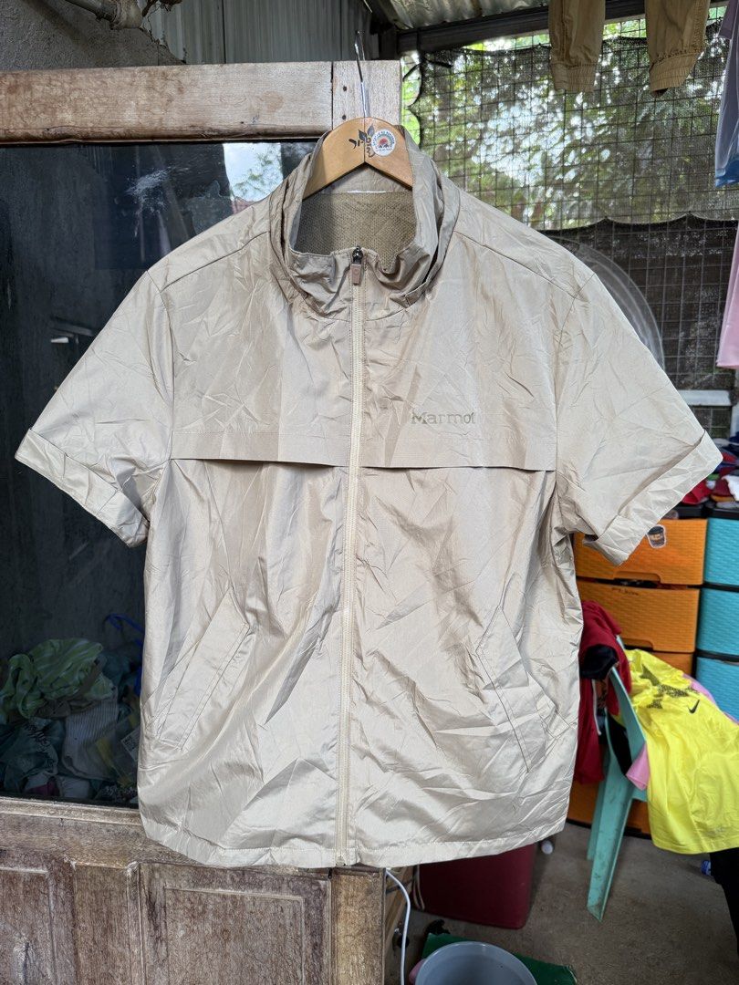 MARMOT Short Sleeve outdoor jacket (Category: Activewear) located in Manolo Fortich. Submitted by thriftacktoe34 (Listing ID 1469698551, Image 1). Description: Excellent condition Color rate 9.5/10 Size XL Dimes W23 x L28 Issue: missing hood FREE shipping fee.