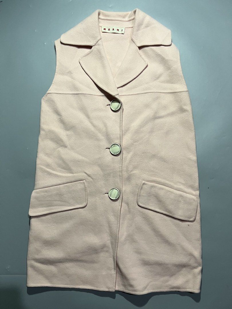 Marni Pink Dress (Category: Sleeveless) located in Iloilo. Submitted by kahit.ano.na.lang (Listing ID 1469736744, Image 1). Description: - Brand: Marni - Authenticity: 100% Authentic, Made in Italy by Marni Group - Size: 36 - Material: Clean pink wool fabric - Design: Sleeveless with lapel collar and front button closure - Details: Two functional flap pockets and matching marble-patterned buttons.