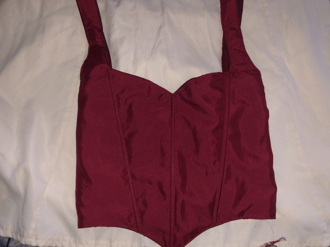 Maroon Red Corset Crop Top with Straps (Category: Sleeveless) located in Manila. Submitted by seethestarrz (Listing ID 1469727312, Image 1). Description: - Color: Deep maroon red with a subtle sheen - Style: Corset crop top with a V-shaped hemline - Support: Structured front boning and vertical panel seams - Neckline & Straps: Sweetheart neckline with thick shoulder straps customized corset top!! dm for measurements 🫶 📍qc, metro manila 🚚 jnt, 