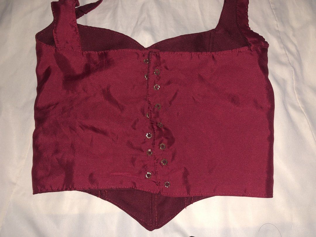 Maroon Red Corset Crop Top with Straps (Category: Sleeveless) located in Manila. Submitted by seethestarrz (Listing ID 1469727312, Image 2). Description: - Color: Deep maroon red with a subtle sheen - Style: Corset crop top with a V-shaped hemline - Support: Structured front boning and vertical panel seams - Neckline & Straps: Sweetheart neckline with thick shoulder straps customized corset top!! dm for measurements 🫶 📍qc, metro manila 🚚 jnt, 