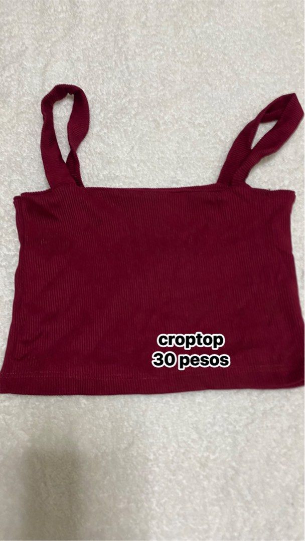 Maroon Ribbed Crop Top (Category: Sleeveless) located in Manila. Submitted by remotorose29730 (Listing ID 1469644386, Image 1). Description: - Color: Maroon - Style: Ribbed crop top with thick shoulder straps and square neckline - Material: Soft and stretchy knit fabric - Versatile: Great for layering or wearing solo - Pairing: Easy to match with high-waisted shorts, skirts, or jeans.