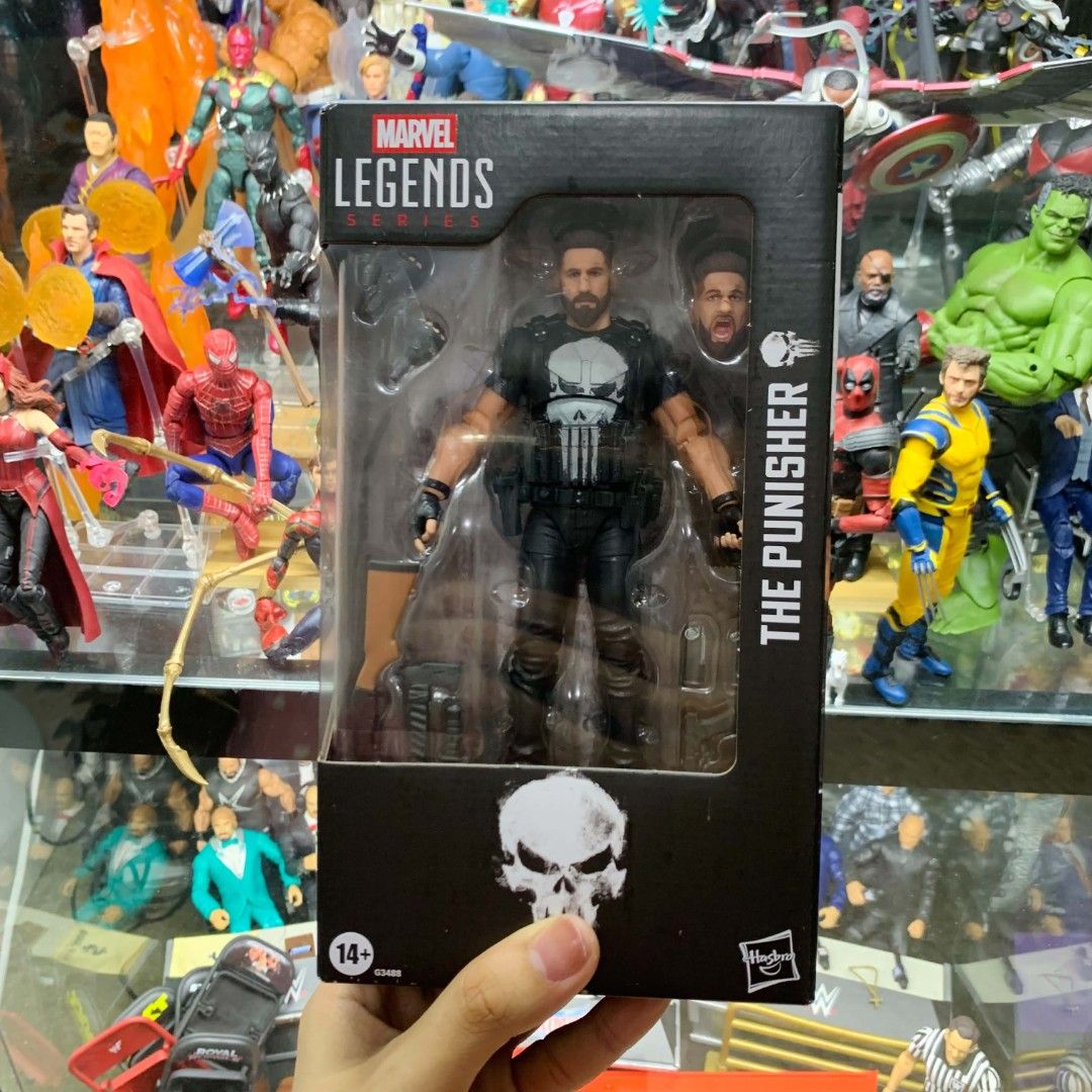 Marvel Legends Series The Punisher Action Figure (Category: Figurines & Statues) located in Manila. Submitted by fasthorse.94b10b (Listing ID 1469678662, Image 2). Description: - Authentic Hasbro Marvel Legends The Punisher action figure - Includes alternate screaming head sculpt and extra hands - Comes with tactical vest, shotgun, and pistols.