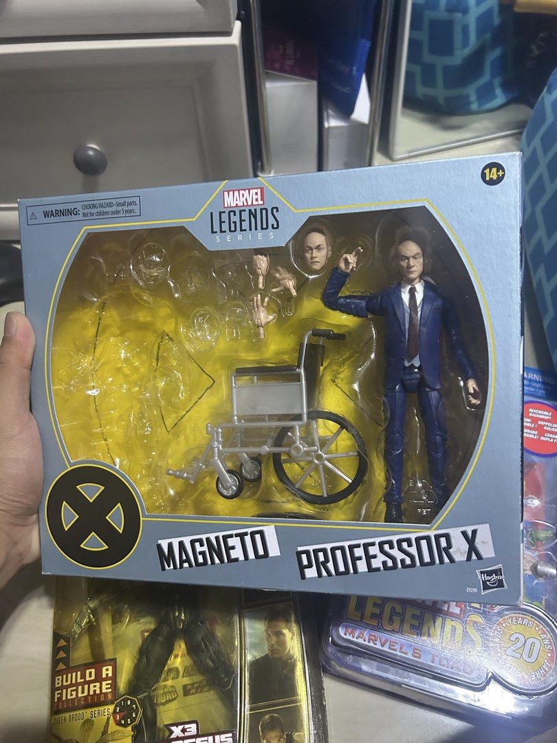 Marvel Legends X-Men Magneto and Professor X (Category: Figurines & Statues) located in Manila. Submitted by lanceycey025890 (Listing ID 1469635856, Image 1). Description: - Authentic Marvel Legends Series Magneto & Professor X 2-Pack - Includes iconic wheelchair accessory - Comes with extra interchangeable heads and hands - Original packaging with clear plastic window intact - Must-have for X-Men and action figure collectors.