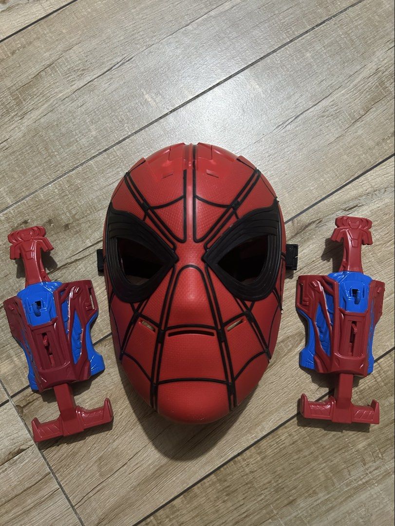 Marvel Spider-Man Costume Mask Web Shooters Set Hasbro (Category: Action & Battle Toys) located in Paranaque City. Submitted by zac.sei (Listing ID 1469679396, Image 2). Description: costume in excellent condition with mask and web blasters for 7up - Complete Spider-Man costume set including bodysuit, mask, and web shooters - Red and blue fabric bodysuit with printed web details - Hard plastic mask and two wrist-mounted toy web shooters with auth