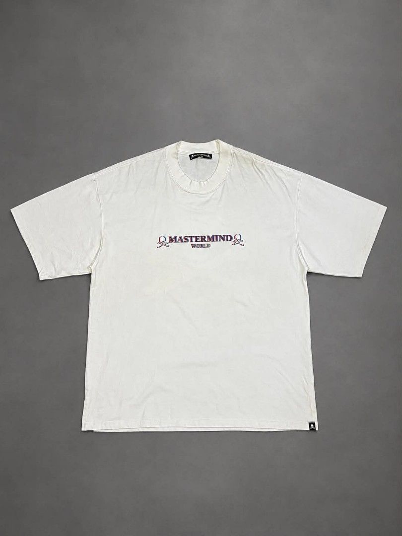 Mastermind World 3D Skull T-Shirt White (Category: Tshirts & Polo Shirts ) located in Urdaneta. Submitted by jayceegarage (Listing ID 1469673271, Image 2). Description: - Brand: Mastermind World - Style: Short sleeve graphic tee - Color: White - Dimes L 30 / W 23 - Size: Small - With stain need wash and small dot hole around neck sa stitching ( check last photo ) - Material: 100% premium cotton - Design: Small skull logo on front, large 3D glitch
