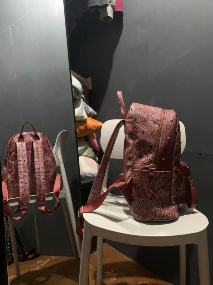 MCM BACKPACK (Category: Backpacks) located in Caloocan City. Submitted by hellnelly21 (Listing ID 1469688701, Image 3). Description: (RED/PINK SNAKESKIN MCM BACKPACK) SIZE: LARGE • LEATHER • GOOD CONDITION • SCRATCHES • HEAVYWEIGHT • COLOR RATE: 9/10 • WITH TAGS • CONDITION RATE: 8/10 • MULTI STUDS LOCATION: DAVAO DEL SUR, DAVAO CITY, TORIL COURIER: JNT,FLASH EXPRESS Edited (COGNAC MCM BACKPACK) SIZE: MEDIUM • LEATHER • GOOD CONDITION • MINIMAL S