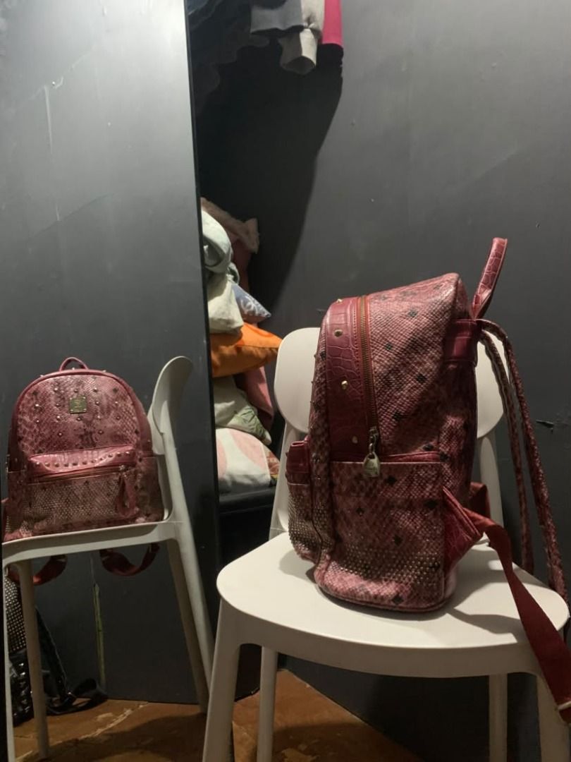 MCM BACKPACK (Category: Backpacks) located in Caloocan City. Submitted by hellnelly21 (Listing ID 1469688701, Image 2). Description: (RED/PINK SNAKESKIN MCM BACKPACK) SIZE: LARGE • LEATHER • GOOD CONDITION • SCRATCHES • HEAVYWEIGHT • COLOR RATE: 9/10 • WITH TAGS • CONDITION RATE: 8/10 • MULTI STUDS LOCATION: DAVAO DEL SUR, DAVAO CITY, TORIL COURIER: JNT,FLASH EXPRESS Edited (COGNAC MCM BACKPACK) SIZE: MEDIUM • LEATHER • GOOD CONDITION • MINIMAL S